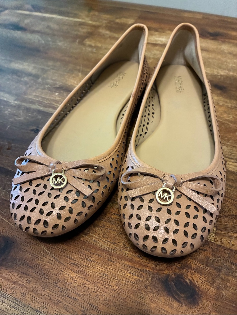 Michael Kors Nude/Tan Perforated Ballet Flats with Bow & MK Charm